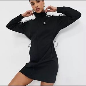 Brand New with Tags. Large Adidas Long Track Top. Got it as a gift and too big.